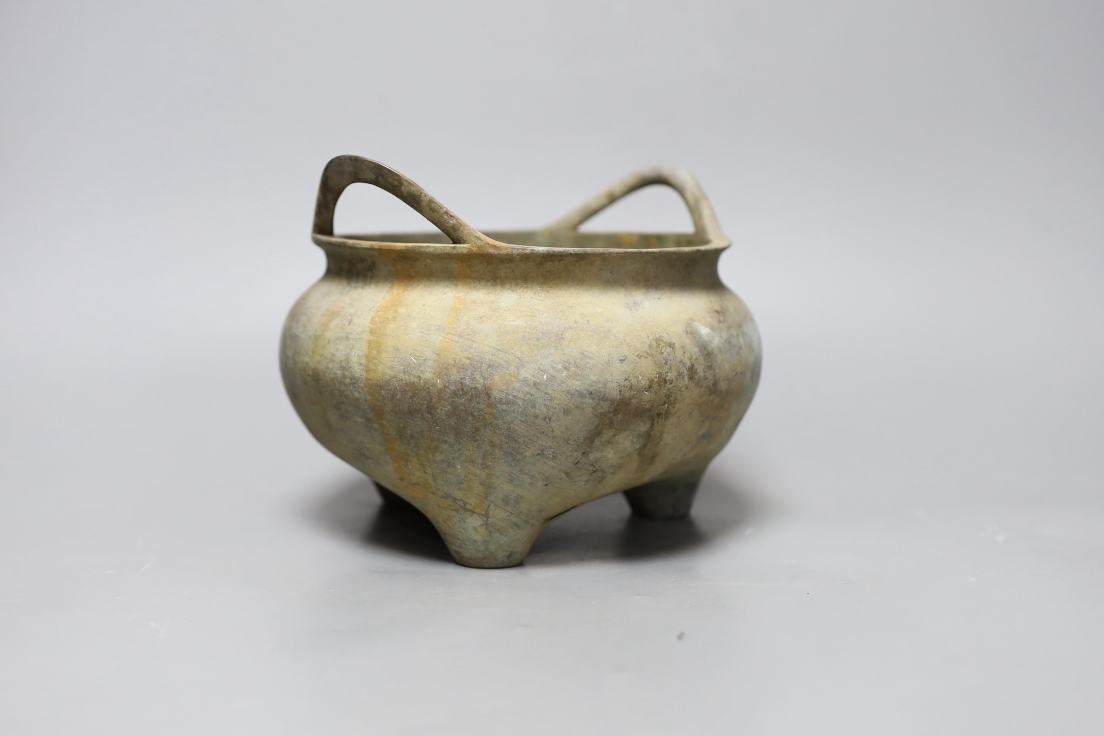 A Chinese two handled bronze censer, 18cm handle to handle